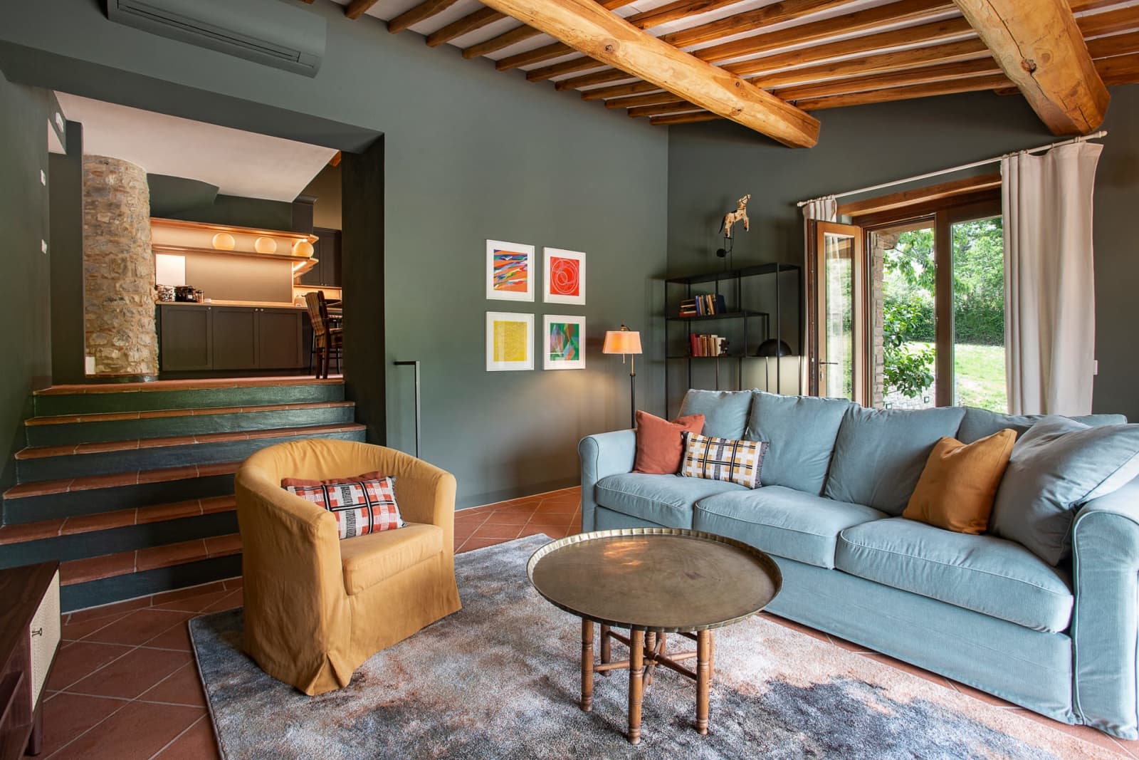 Casa Pernicella — the lounge, with prints over the sofa