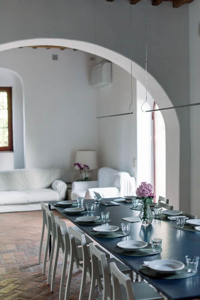 Villa Castellaro — a sitting room with white armchairs
