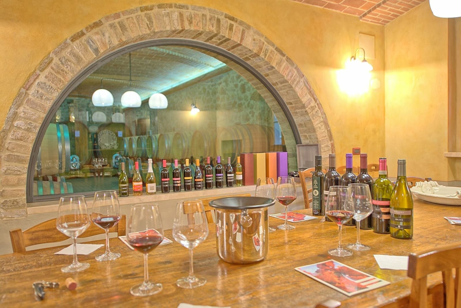 Tenuta La Barricaia — the tasting room beneath a stone arch