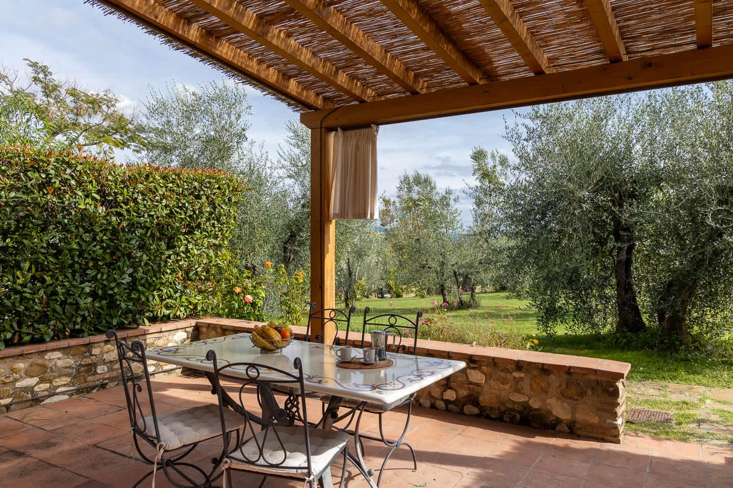 Casale Olivaio — the covered wooden veranda