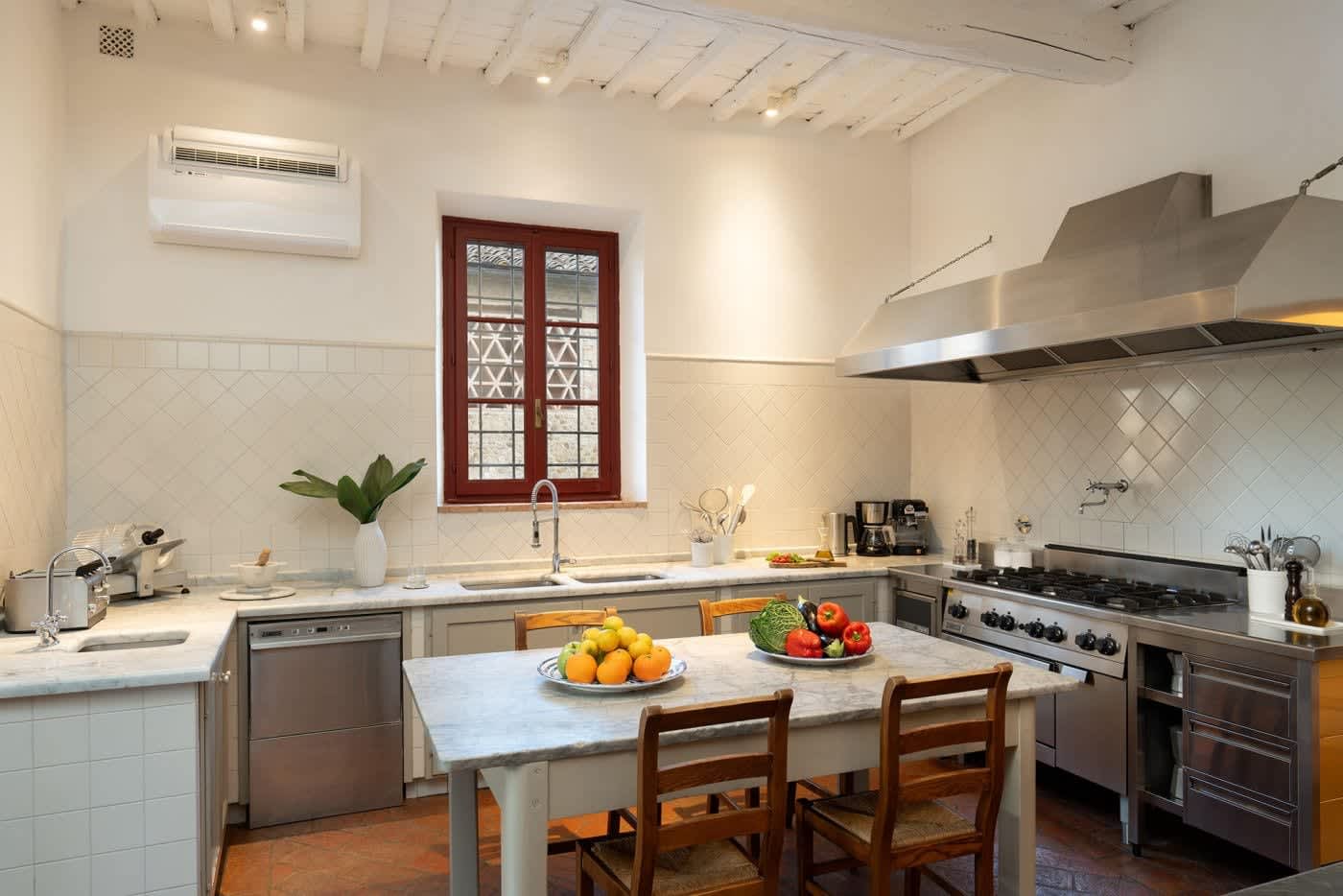 Villa Castellaro — the kitchen, with fruit on the marble island