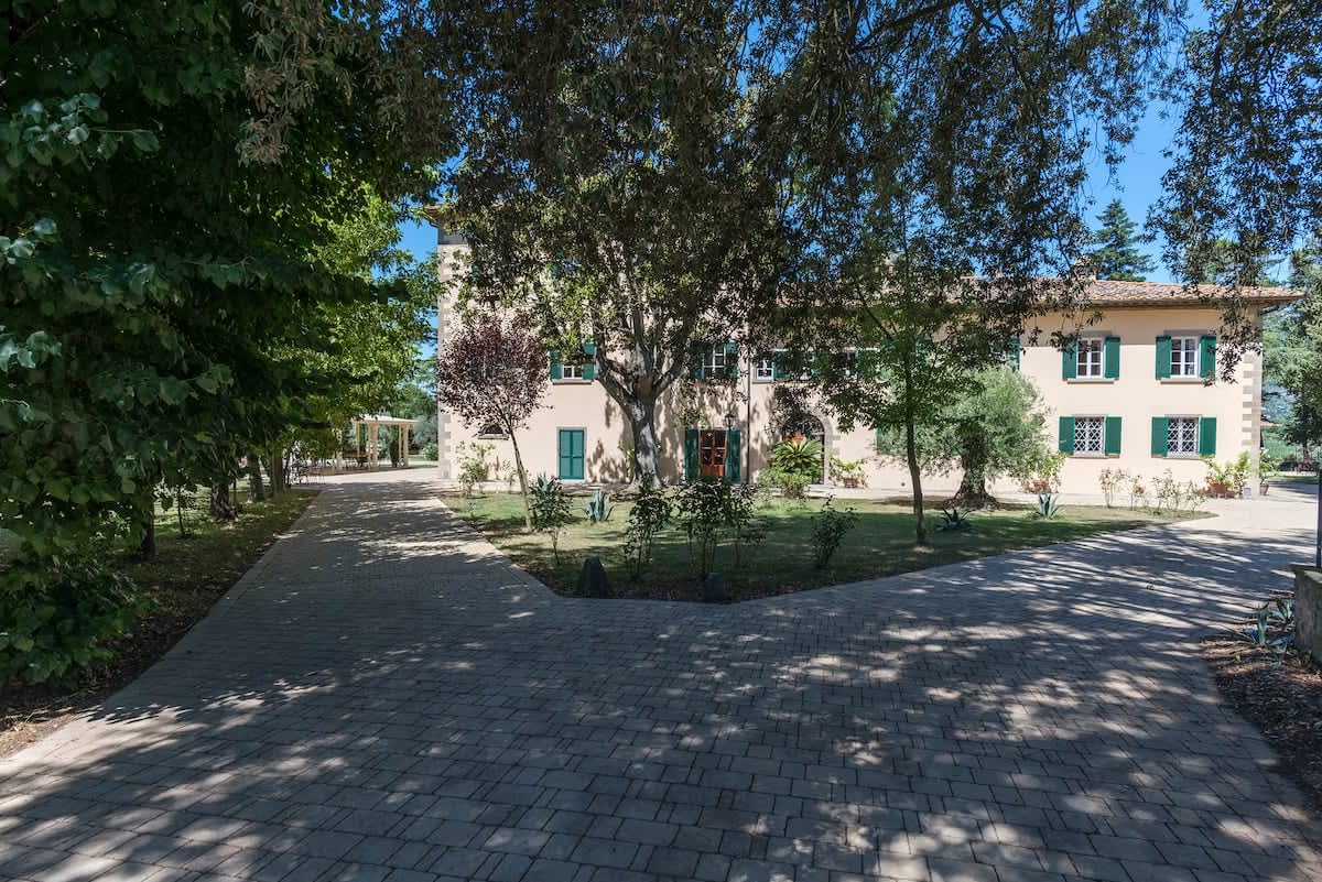 Villa della Cappella — a garden path leading to the house