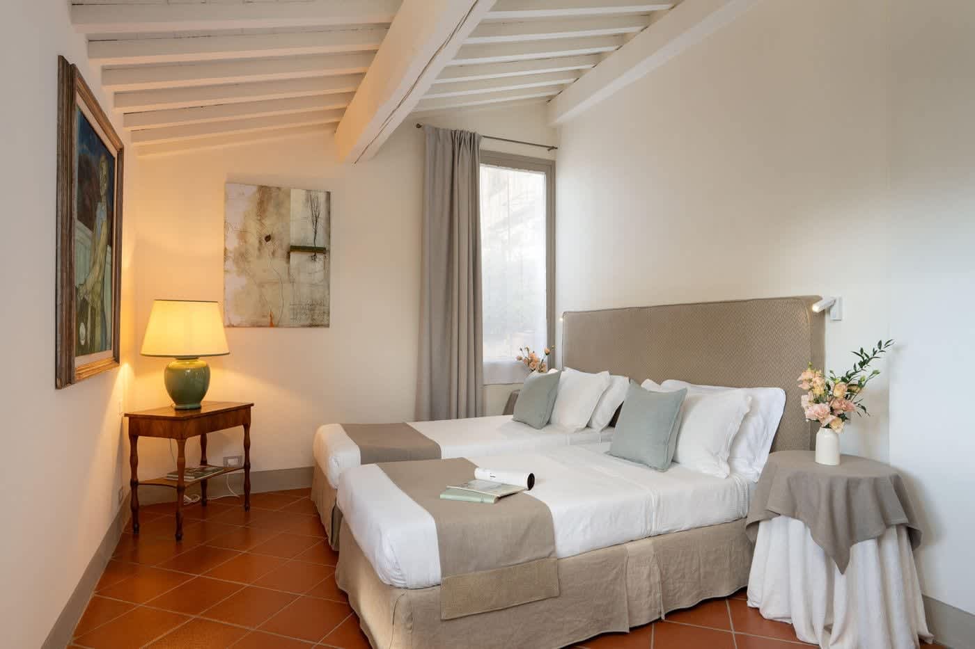 Casa Lilia — a double bedroom beneath the beams