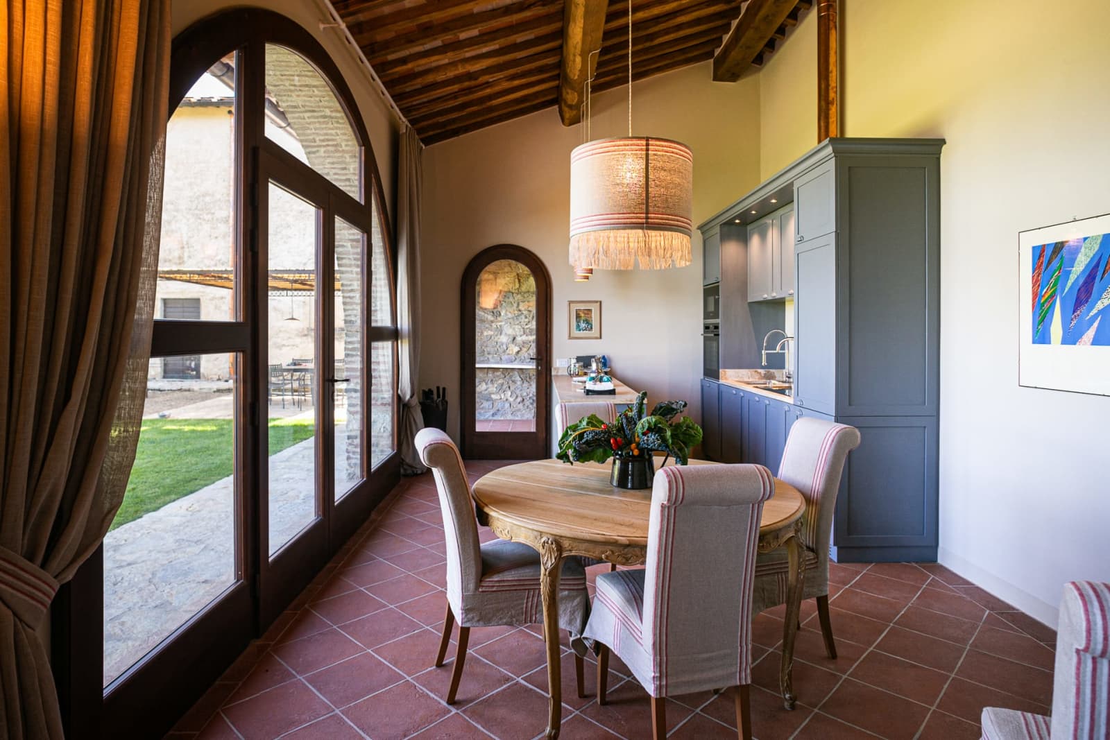 Casa Faraonia — the dining table beside an arched door