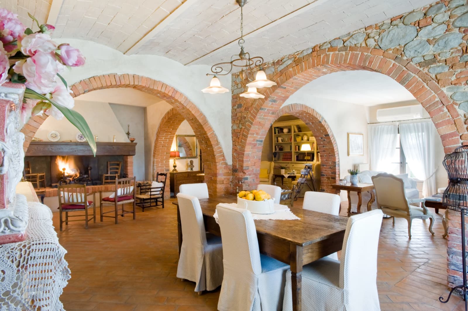 Villa Il Colto — the dining room under brick arches
