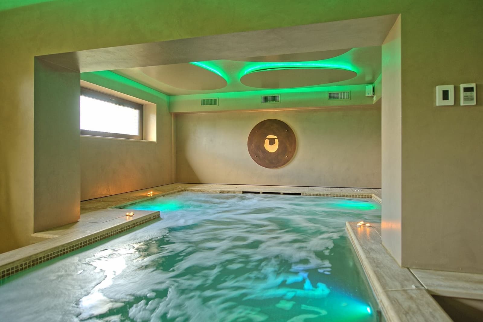 Tenuta La Barricaia — the indoor pool under coloured light