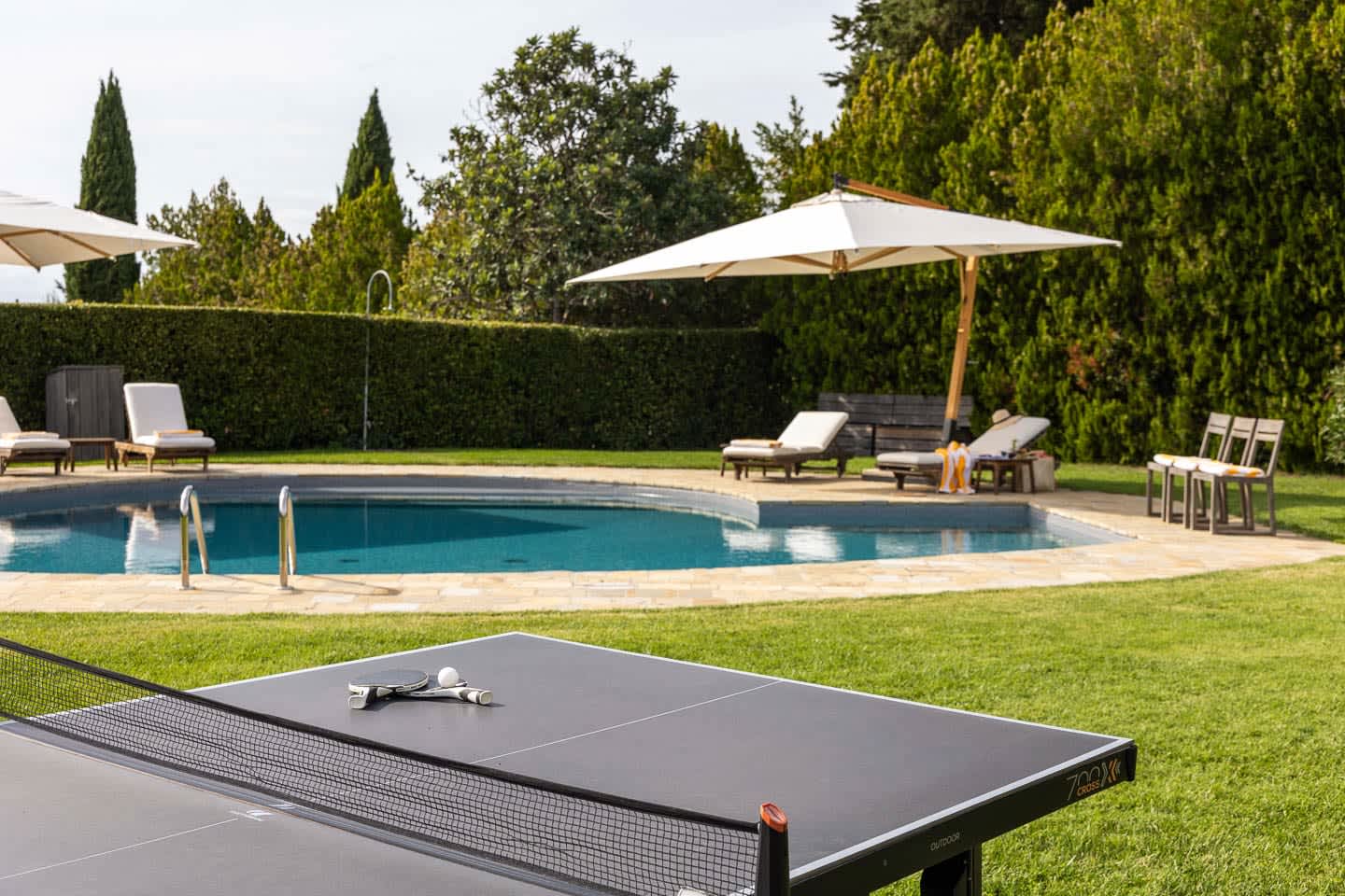 Casale Olivaio — loungers by the salt-water pool