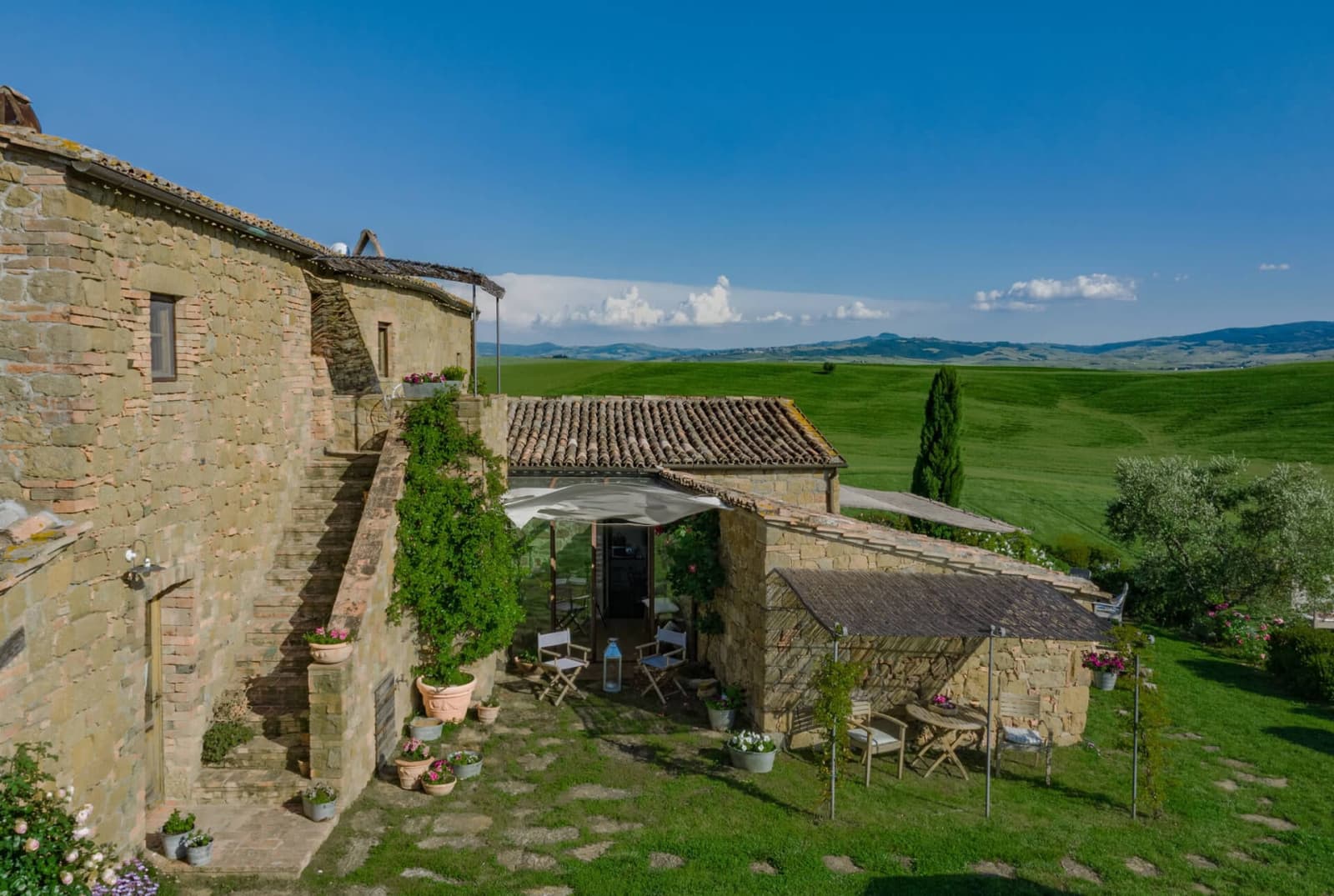 Villa delle Sorelle — the stone house and its outbuildings