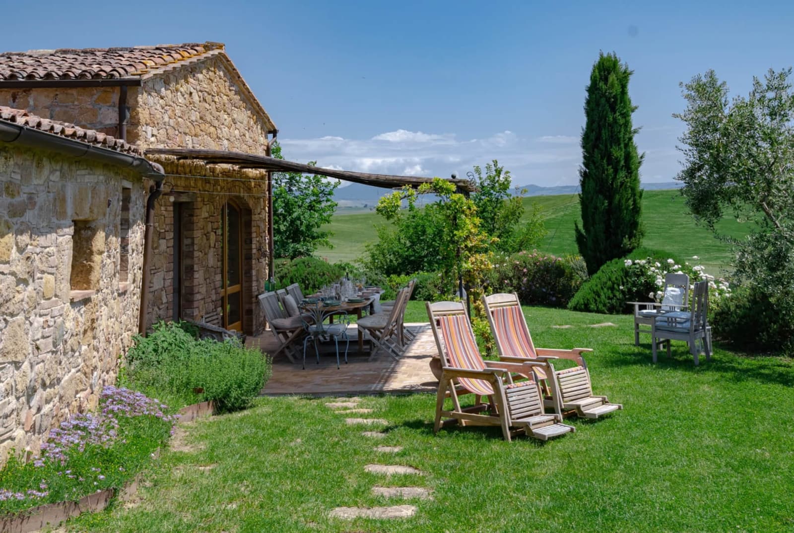 Villa delle Sorelle — deckchairs on the lawn by the house