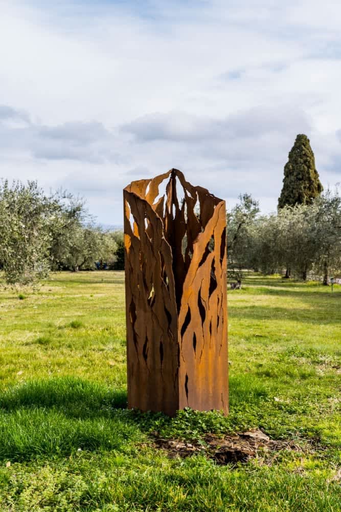 Villa Castellaro — an iron sculpture in the olive grove