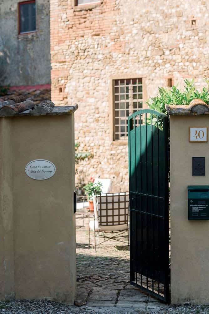 Villa Castellaro — the entrance gate in the old stone wall