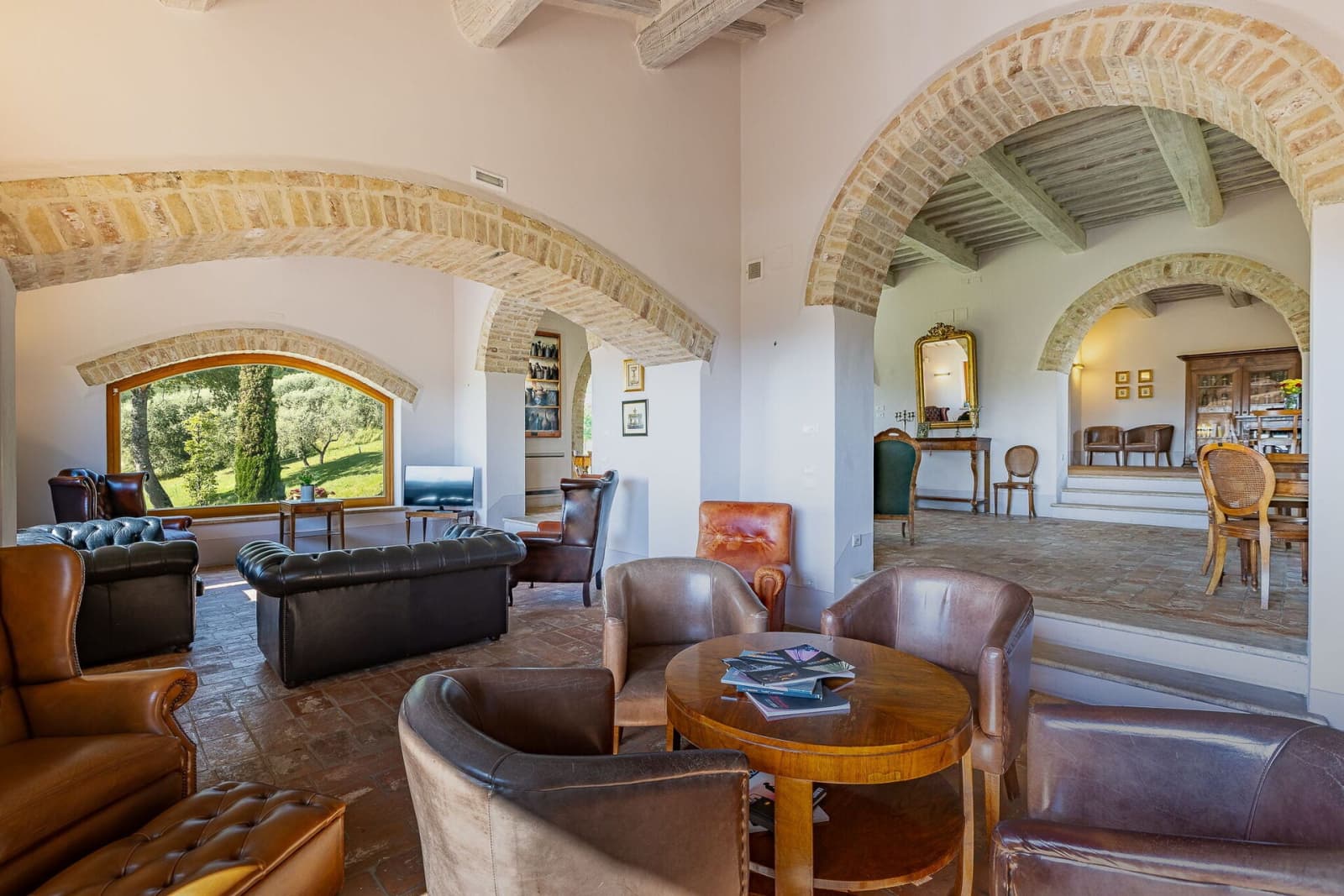 Tenuta La Barricaia — the living room's leather sofas and armchairs