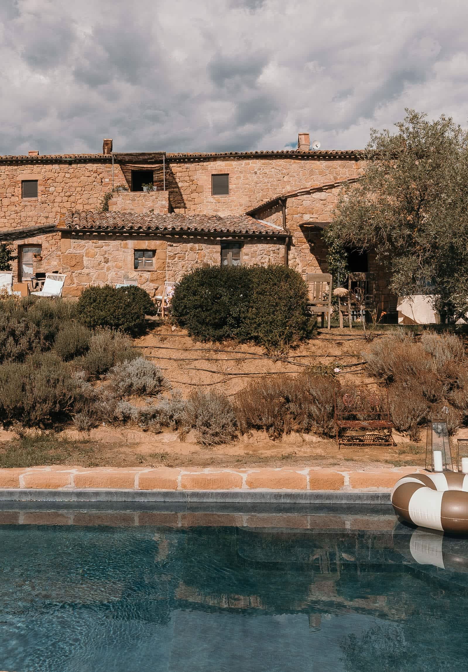 Villa delle Sorelle — lavender and stone walls in the garden