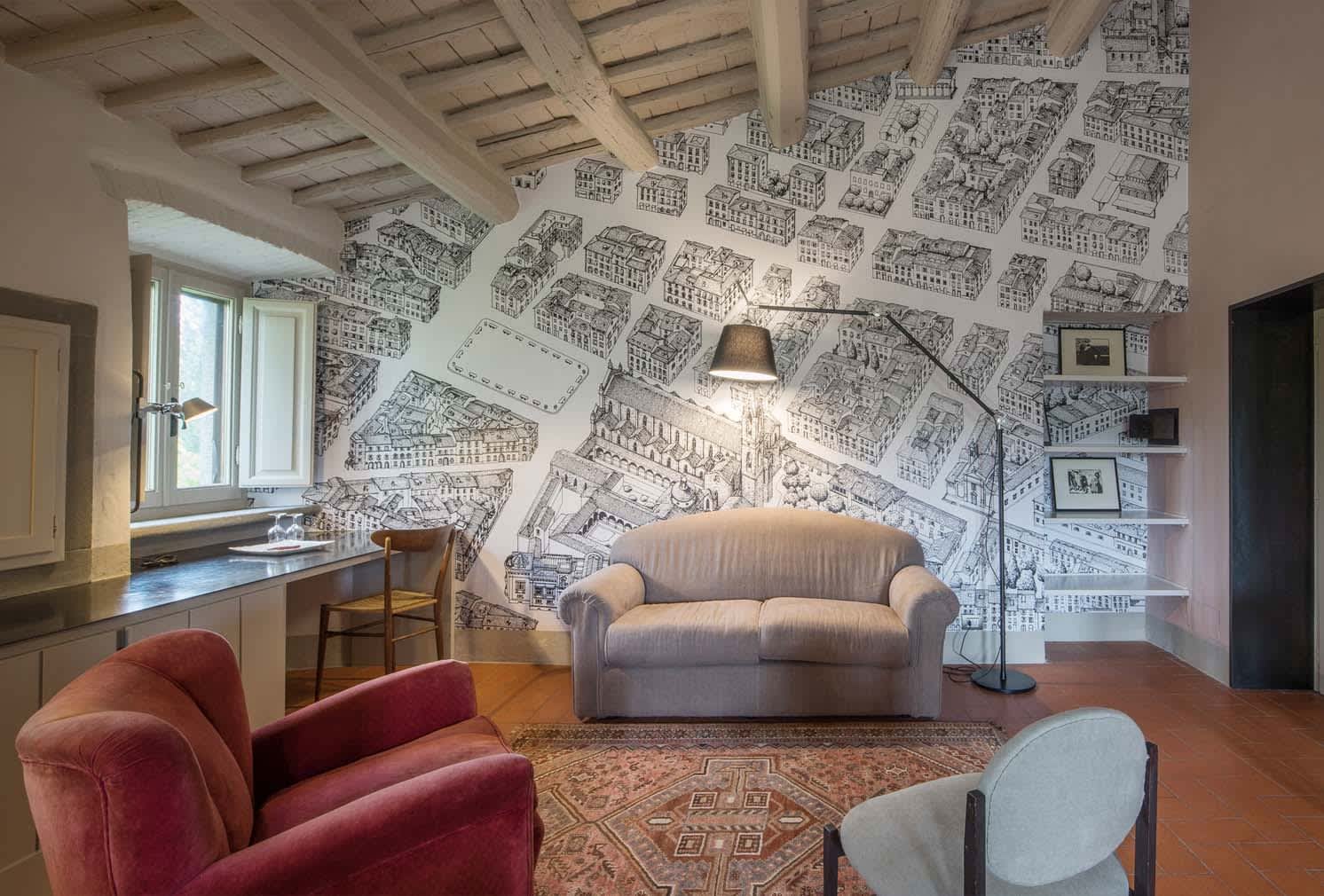 Casale Gherardi — a room with a mural of medieval Florence by artist Simone Boni