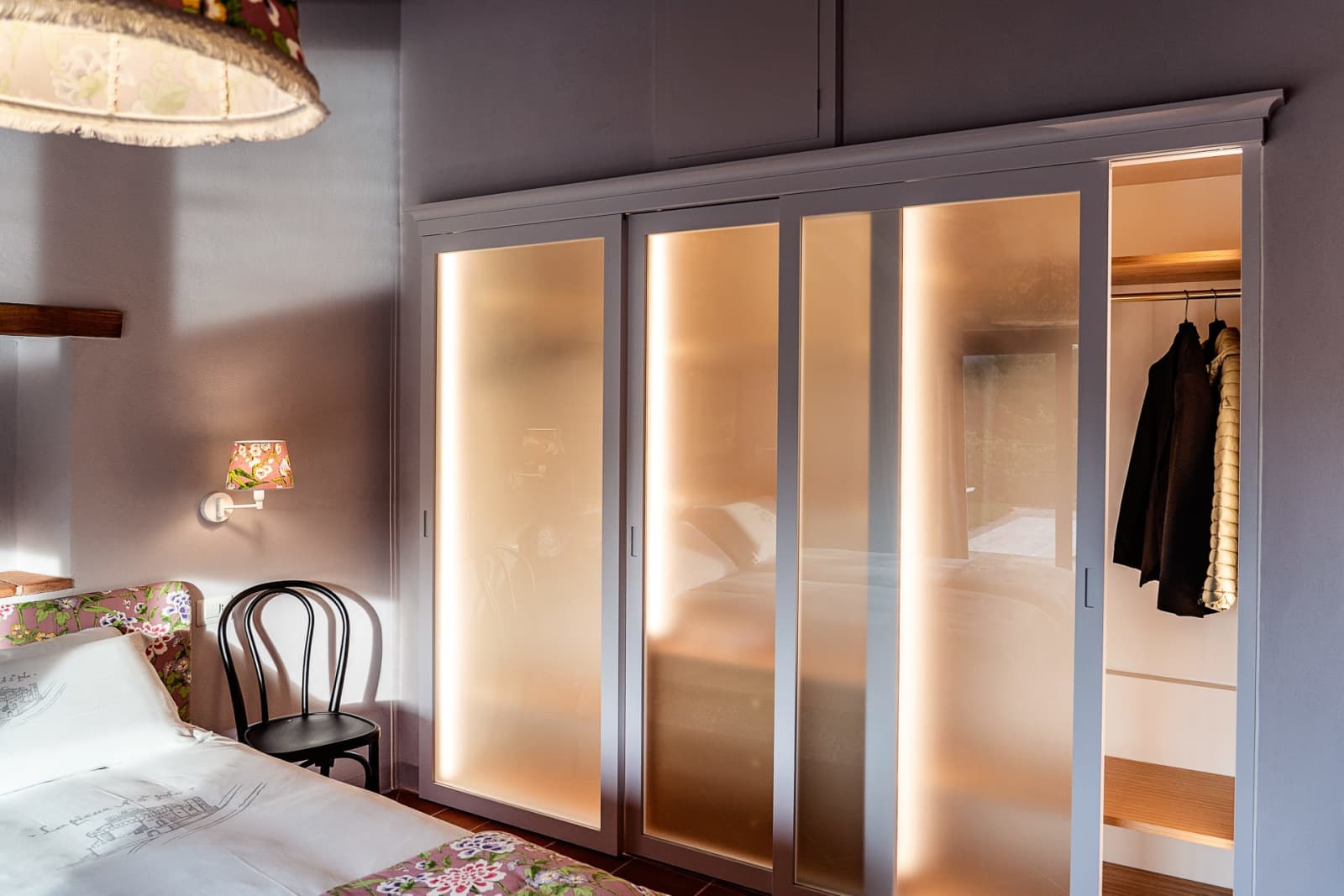 Casa Pernicella — softly lit wardrobes