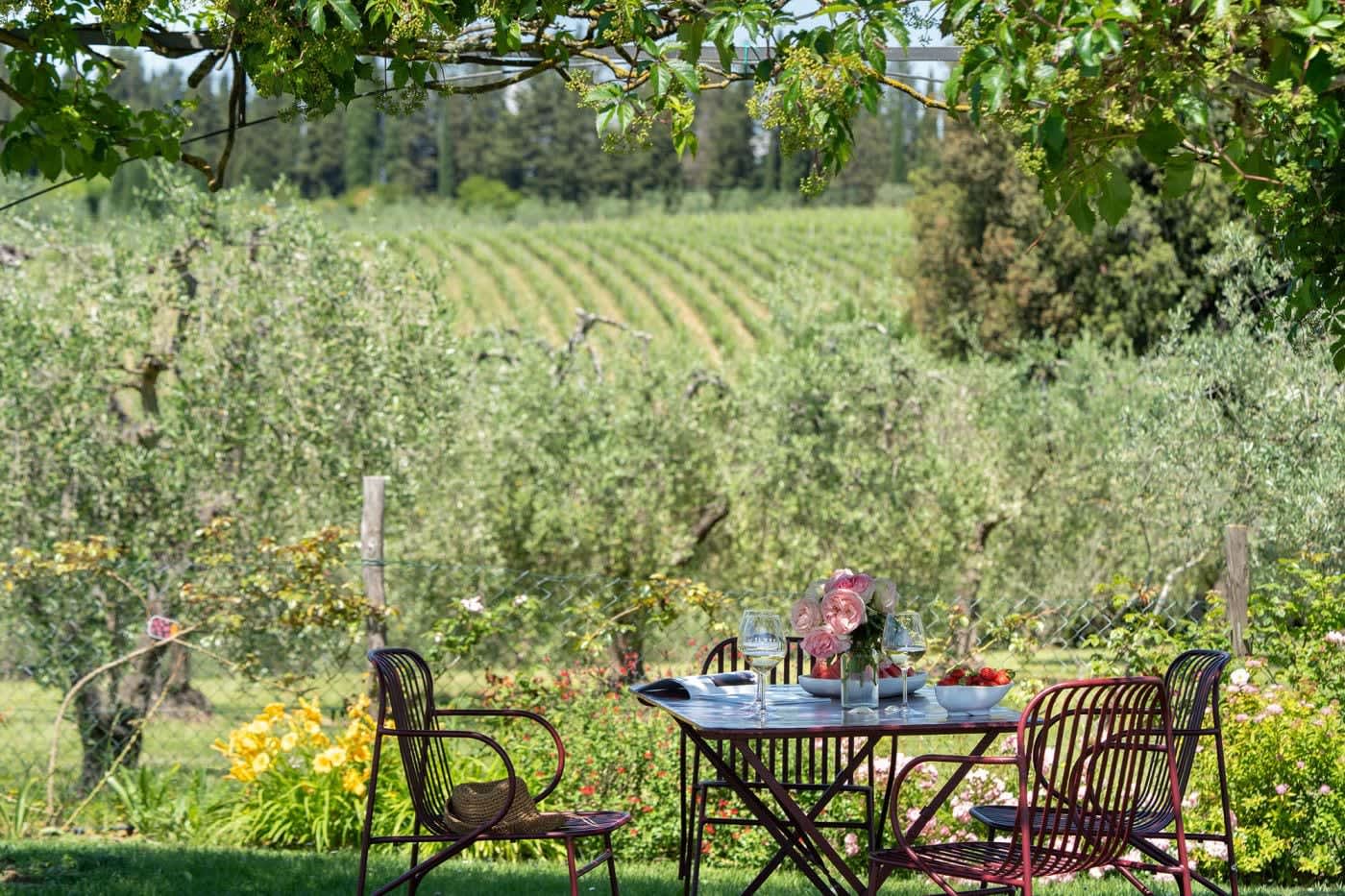 Villa Castellaro — a garden table set above the vineyards