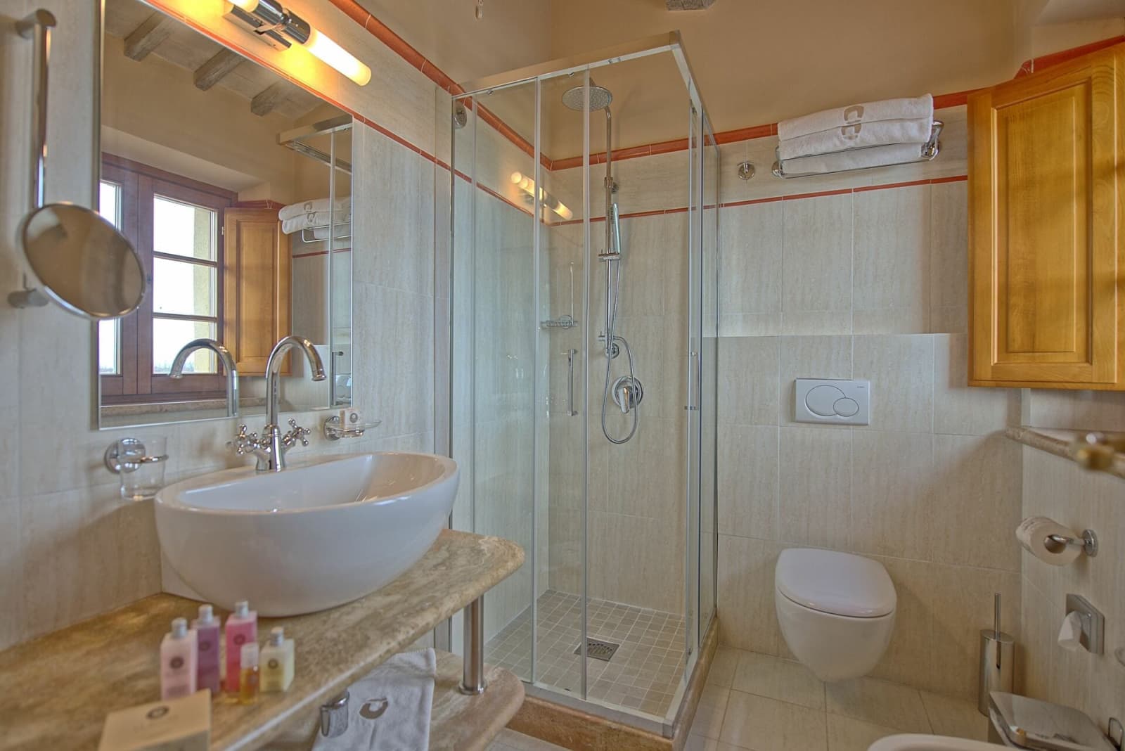 Tenuta La Barricaia — an en-suite shower room with a vessel basin