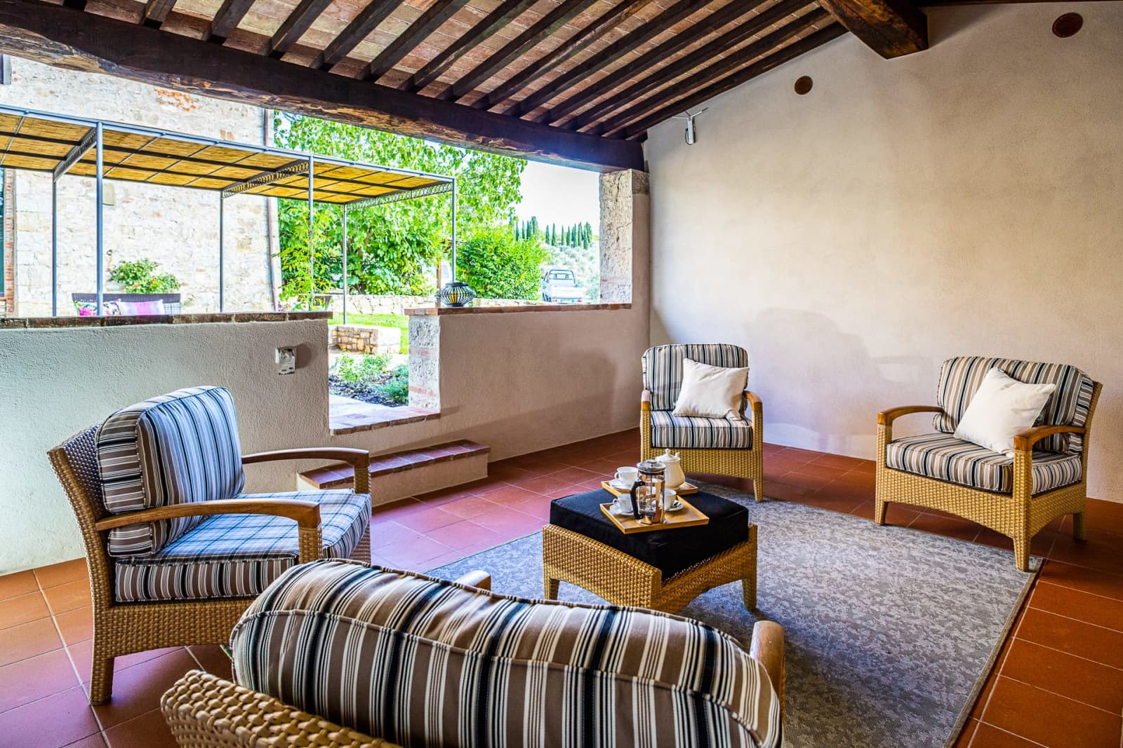 Casa dell'Erta — the annex lounge opening to the garden