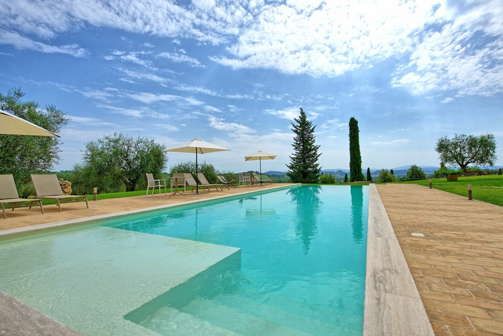 Tenuta La Barricaia — the pool's edge, looking out over the countryside