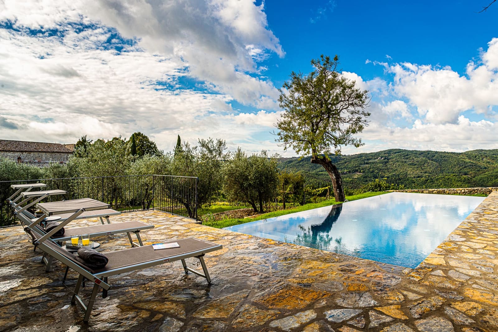 Casa dell'Erta — the infinity pool and its stone terrace