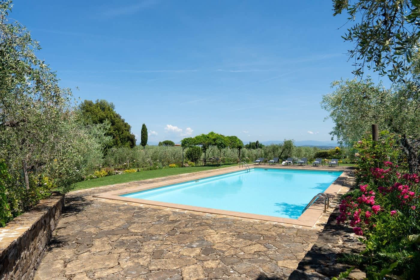 Villa Castellaro — the pool and its stone surround