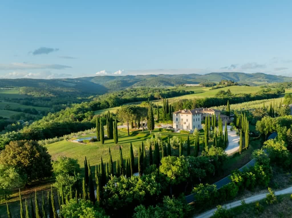 Tenuta Belvedere Estate: Tenuta Belvedere — the villa amid cypresses and Chianti hills