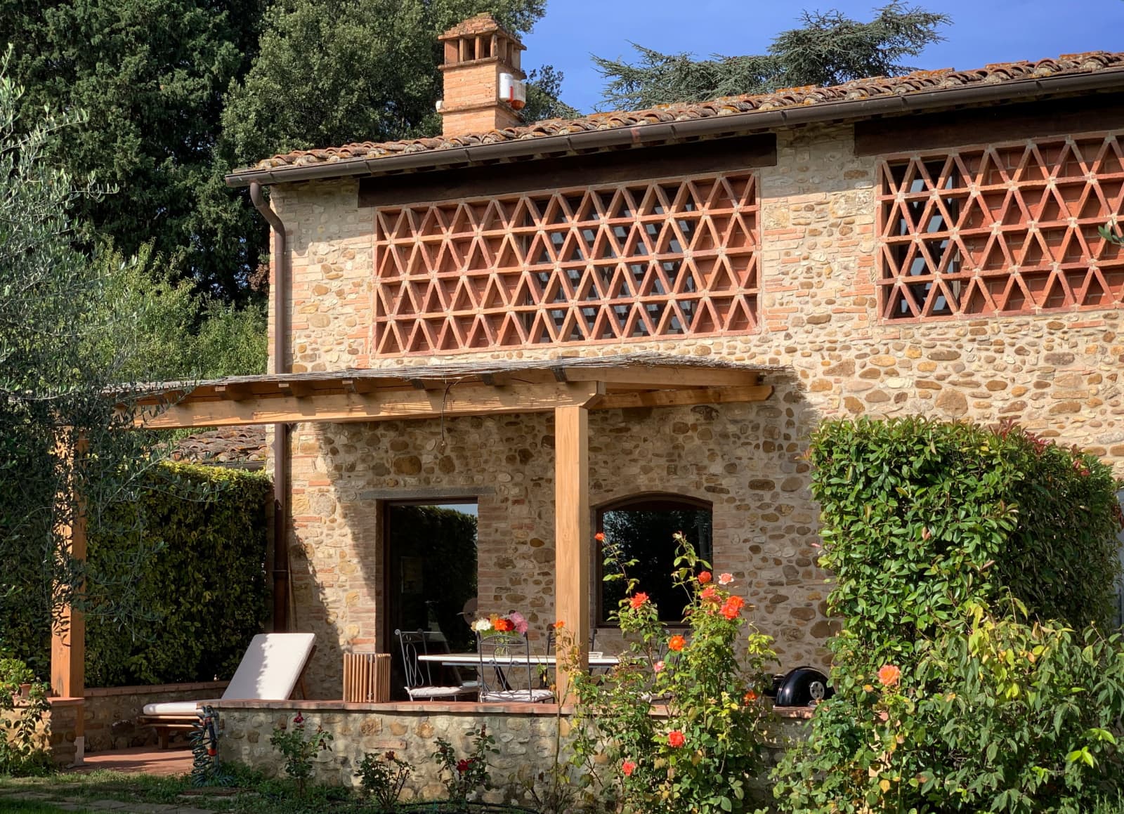 Casale Olivaio — the stone farmhouse and its patio