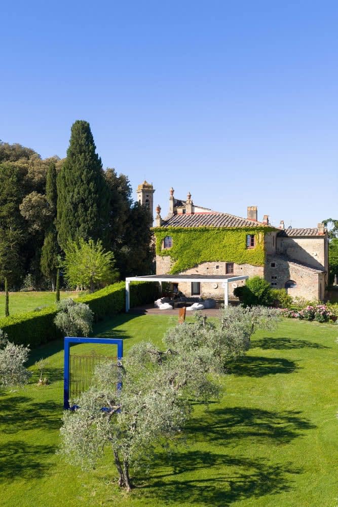 Villa Castellaro — the villa's tower above the pool pergola
