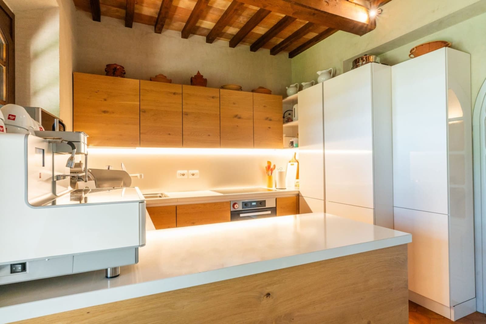 Villa San Bartolomeo — the kitchen, island in the foreground