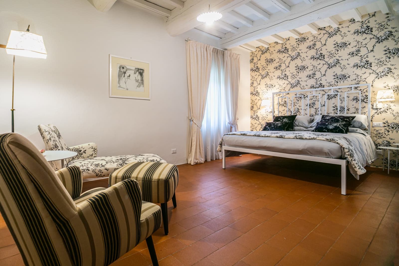 Casa dell'Erta — a bedroom by the window