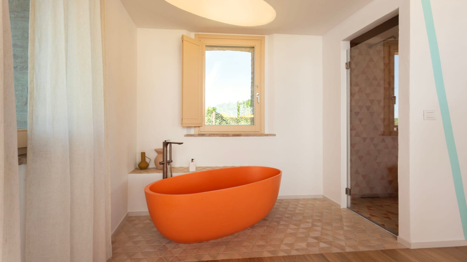 Podere Mastrojanni — the dependance bathroom, with a freestanding tub