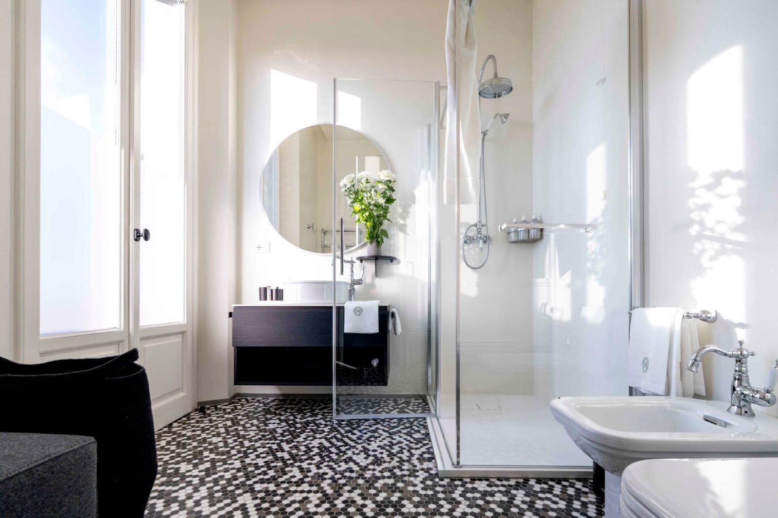 Tenuta Belvedere Estate: Tenuta Belvedere — a bathroom with black-and-white mosaic tile
