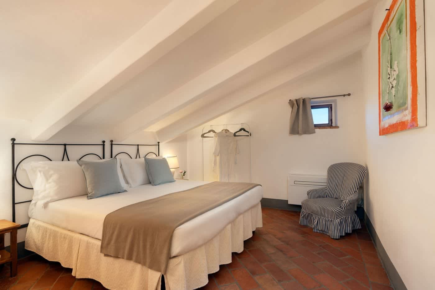 Villa Castellaro — a bedroom under the eaves