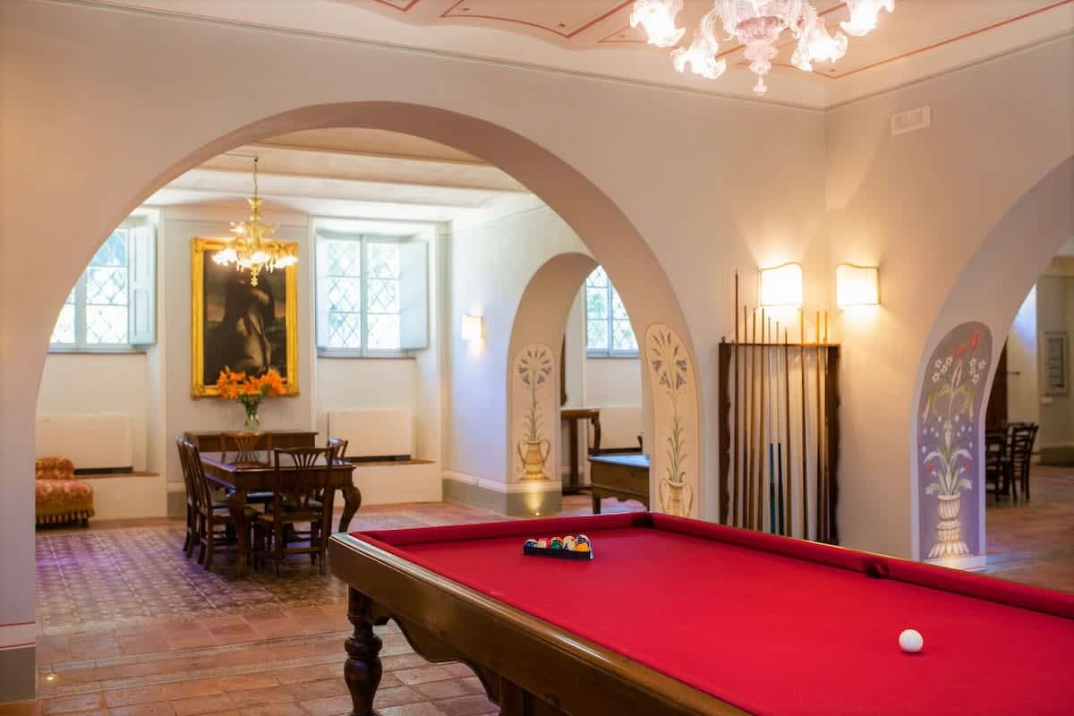 Villa della Cappella — the games room, seen through an archway