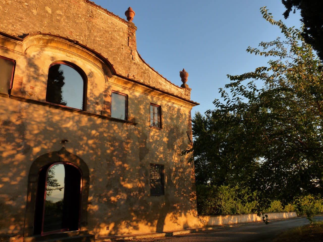 Villa Castellaro — the villa's façade at sunrise