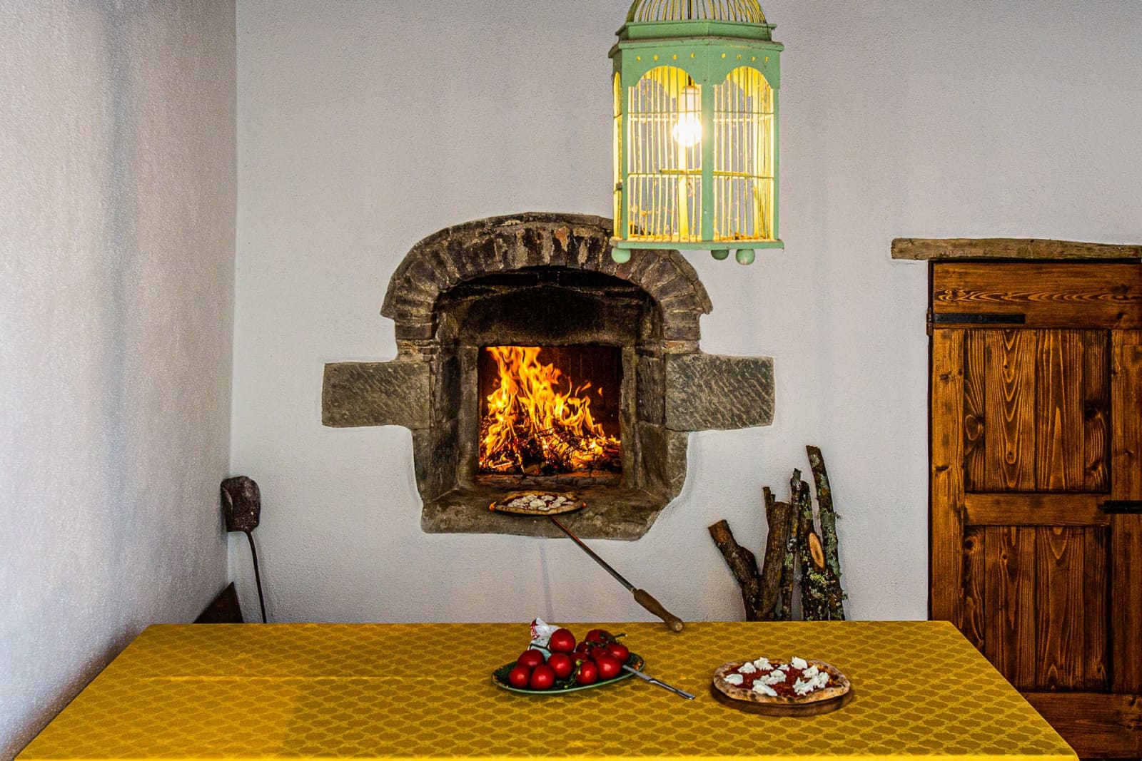 Casa dell'Erta — a wood fire in the hearth