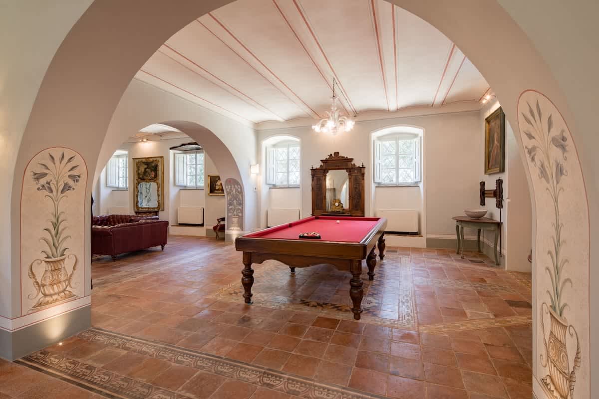 Villa della Cappella — the games room with an ornate mirror