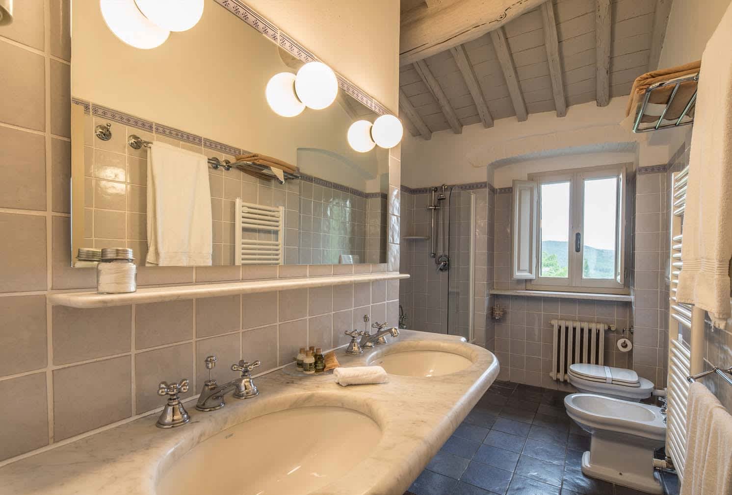 Casale Gherardi — a double-vanity bathroom in Carrara marble