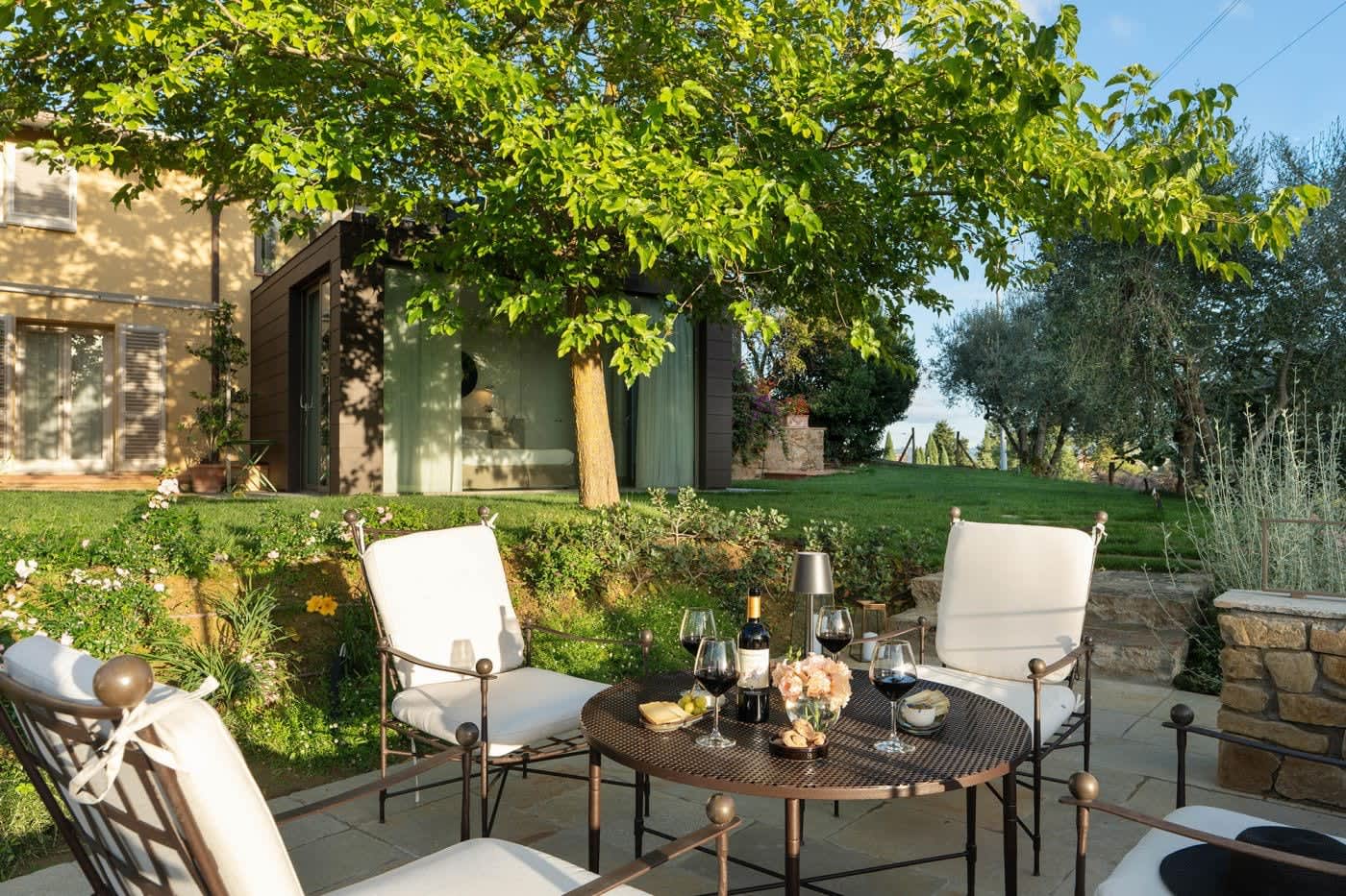 Casa Lilia — a table set in the garden