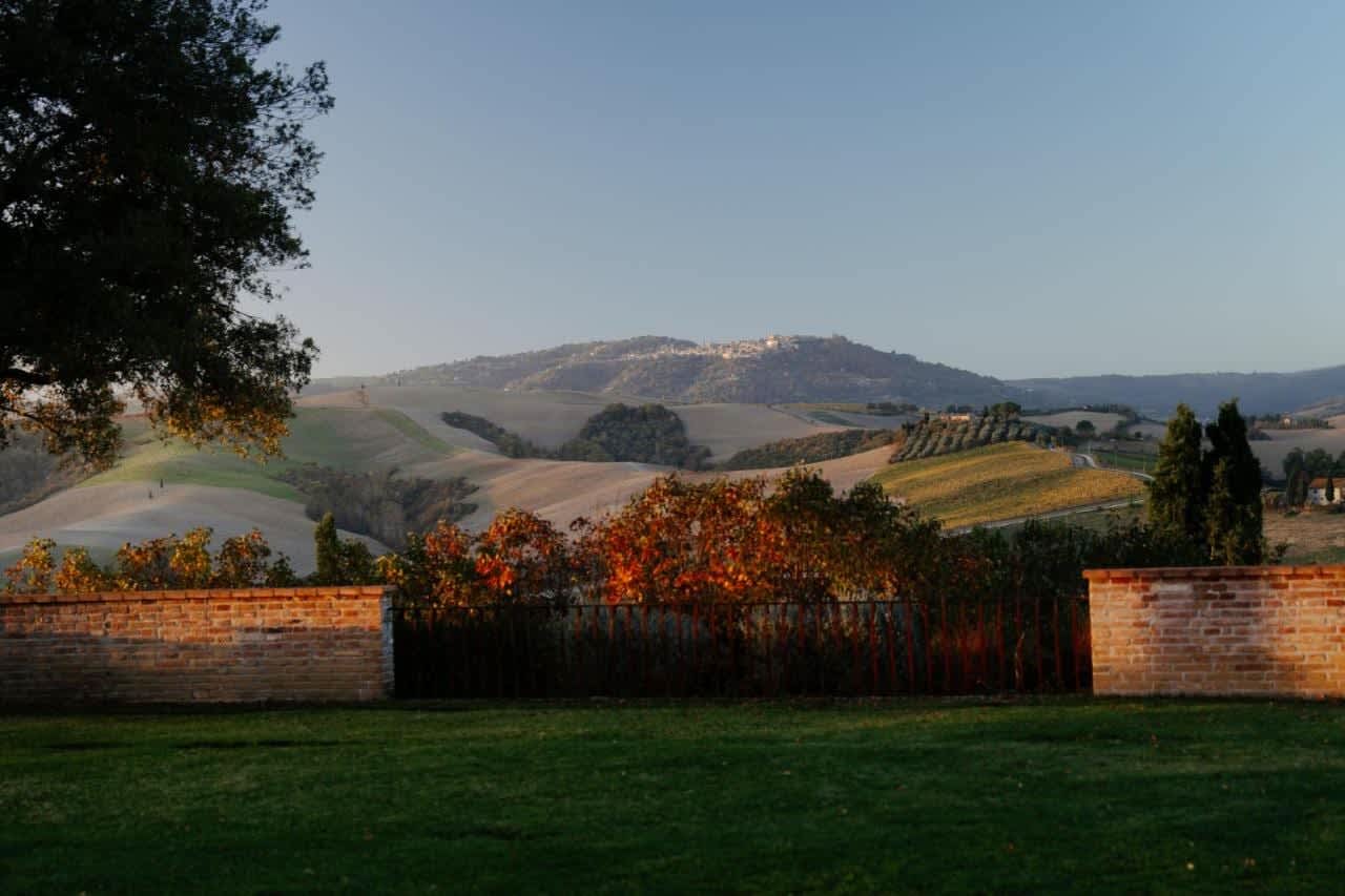 Villa Poggio d'Oro — the garden and hills at dusk
