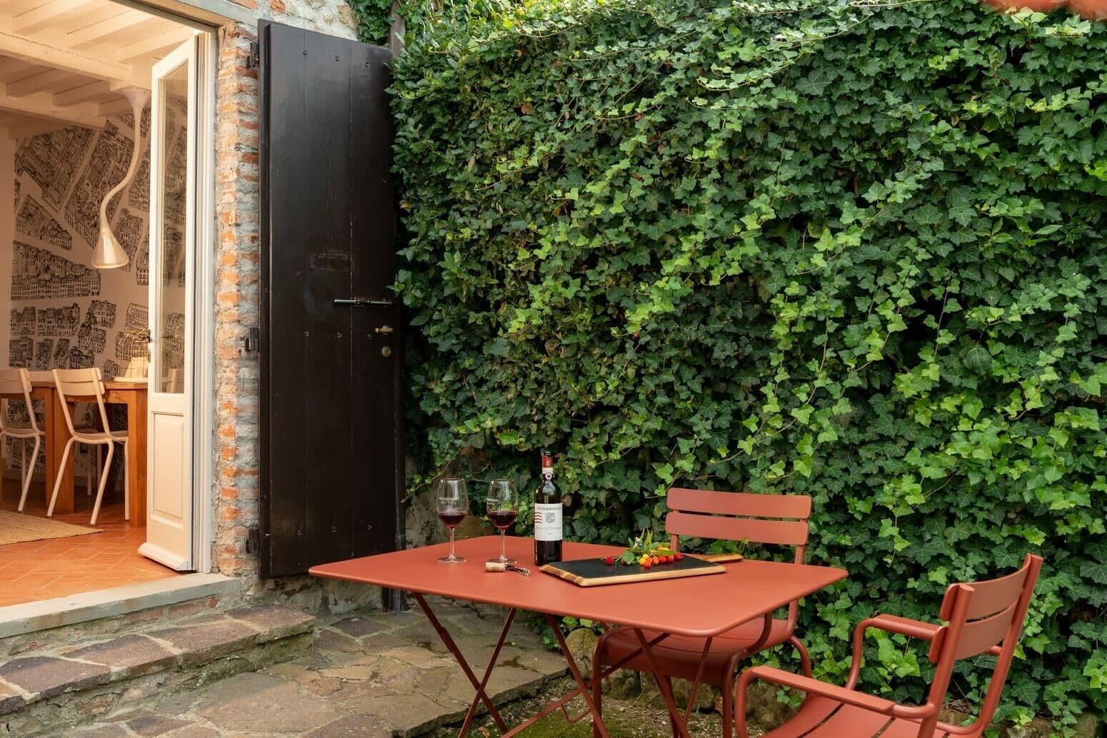 Casale Gherardi — a private courtyard table beside the house