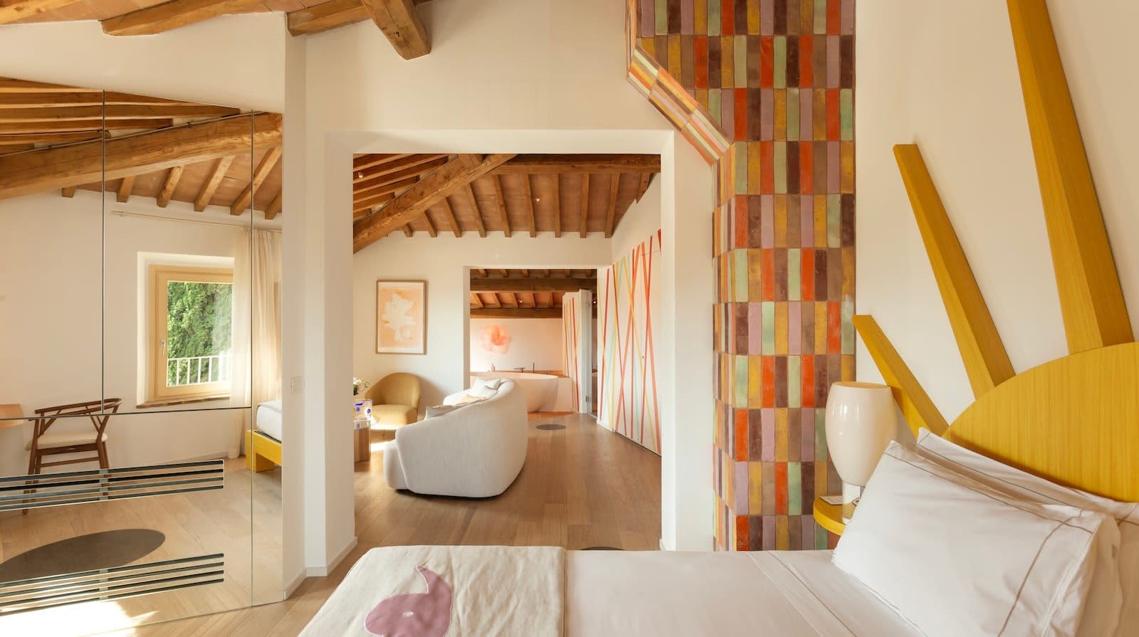 Podere Mastrojanni — a mirrored wardrobe opening onto another room