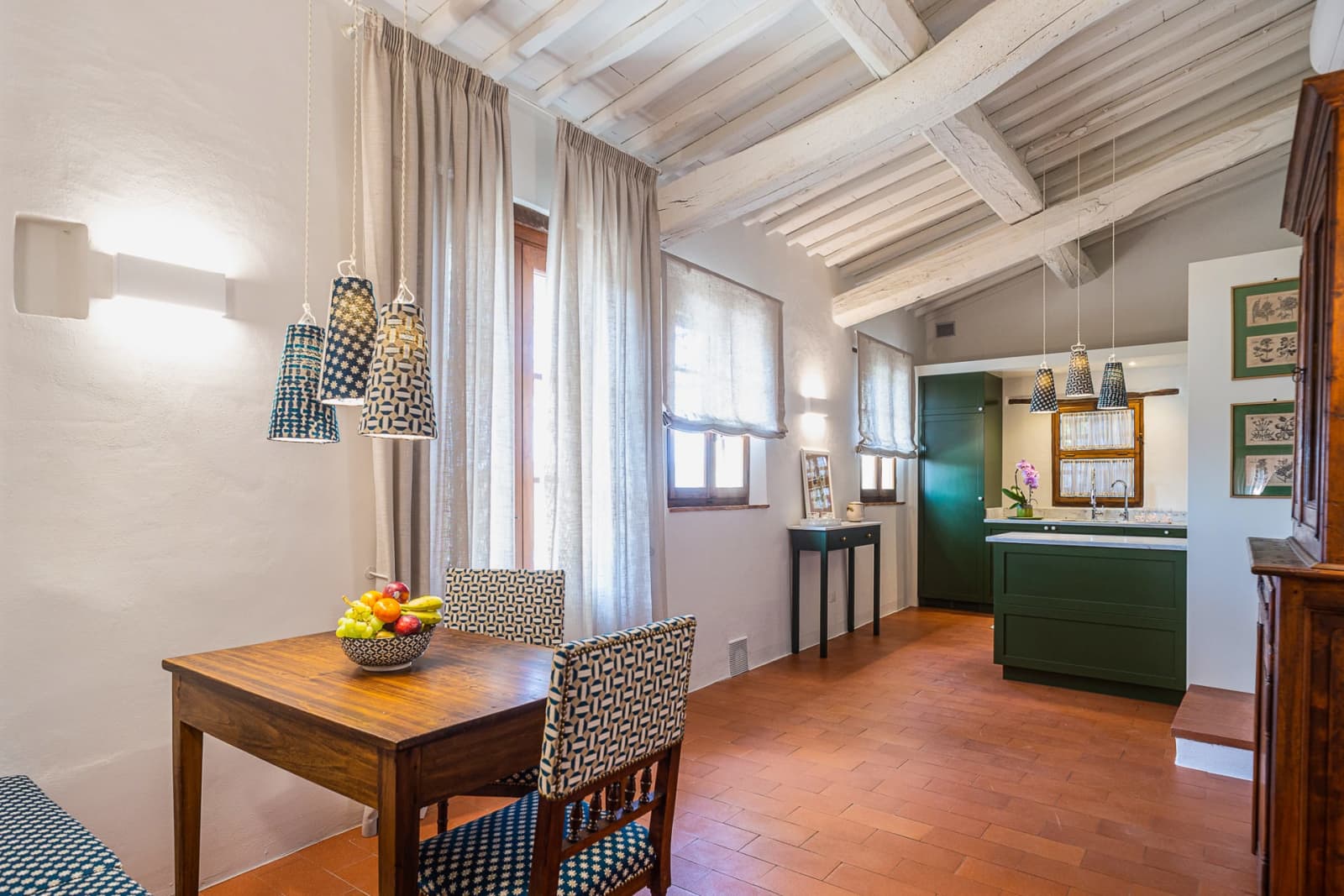 Casa dell'Erta — a dining corner by the windows