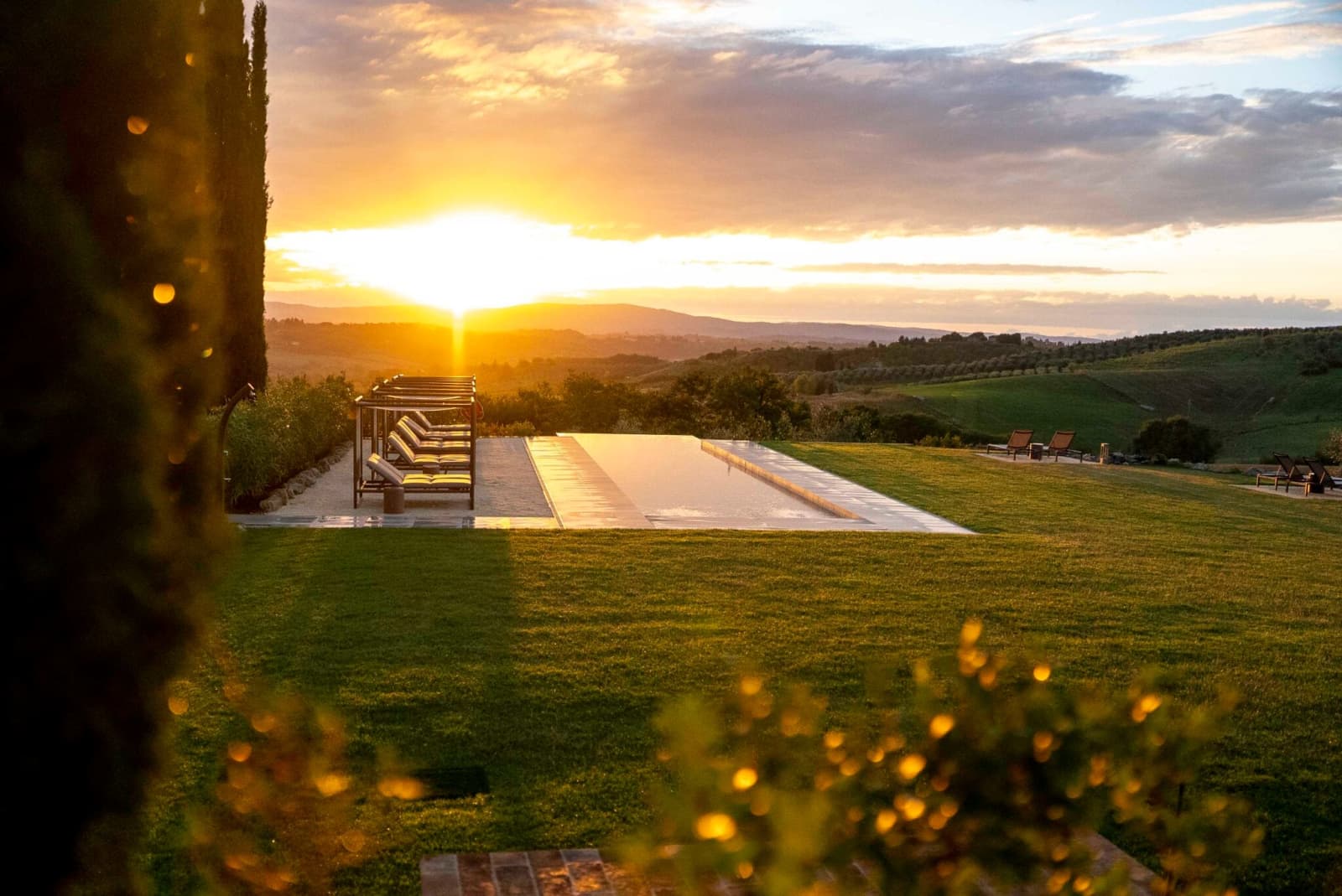 Tenuta Belvedere Estate: Tenuta Belvedere — sunset over the pool