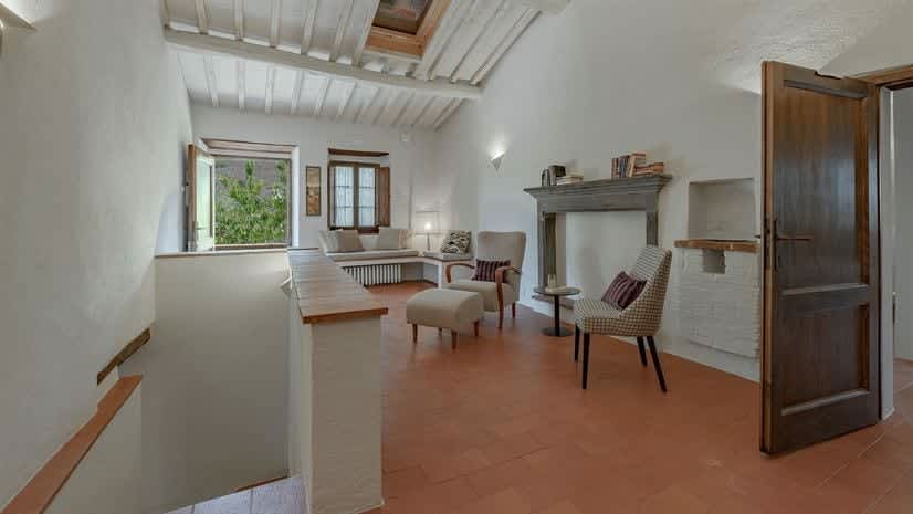 Borgo delle Vigne — a sitting room with fireplace