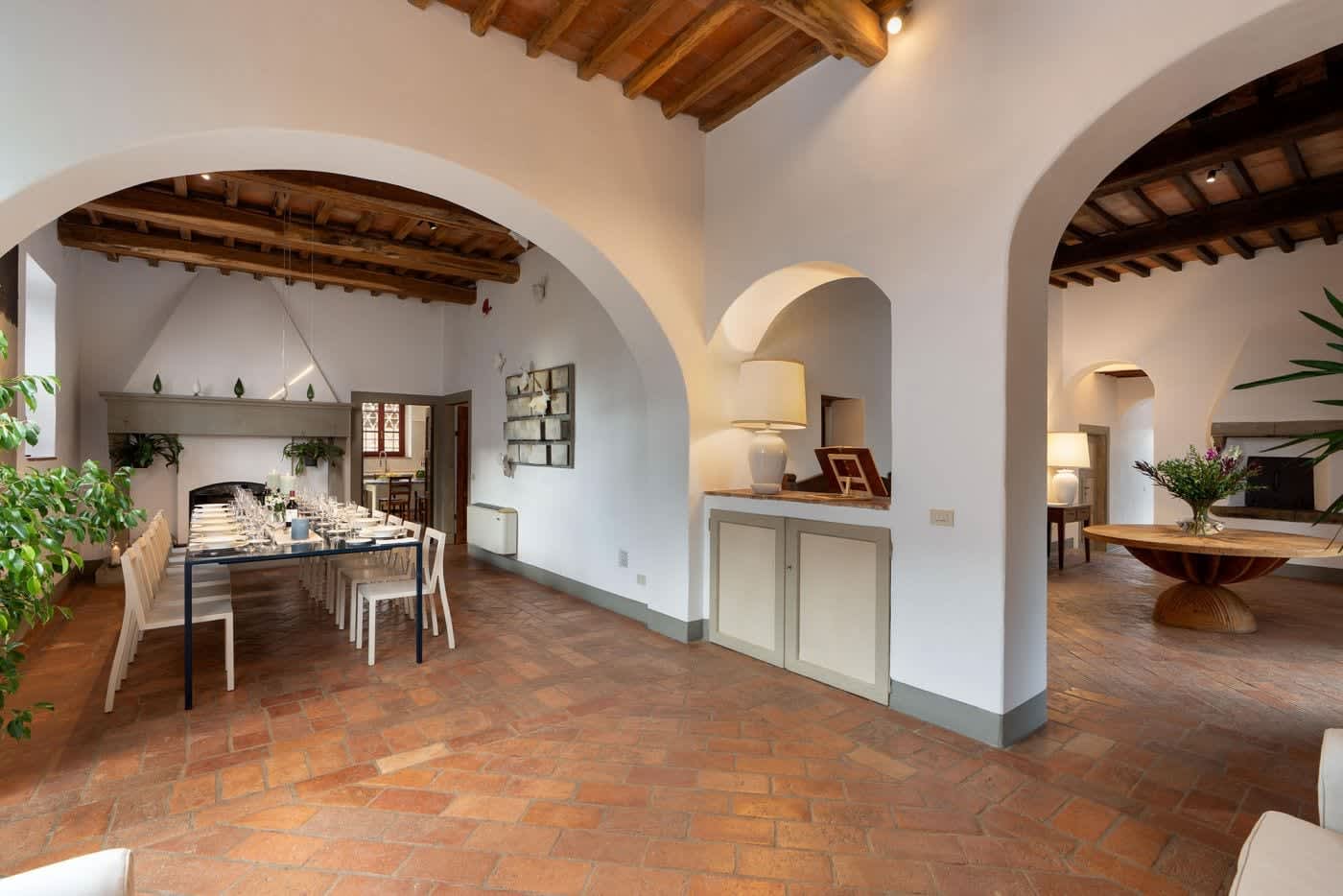 Villa Castellaro — the dining hall through its stone arches