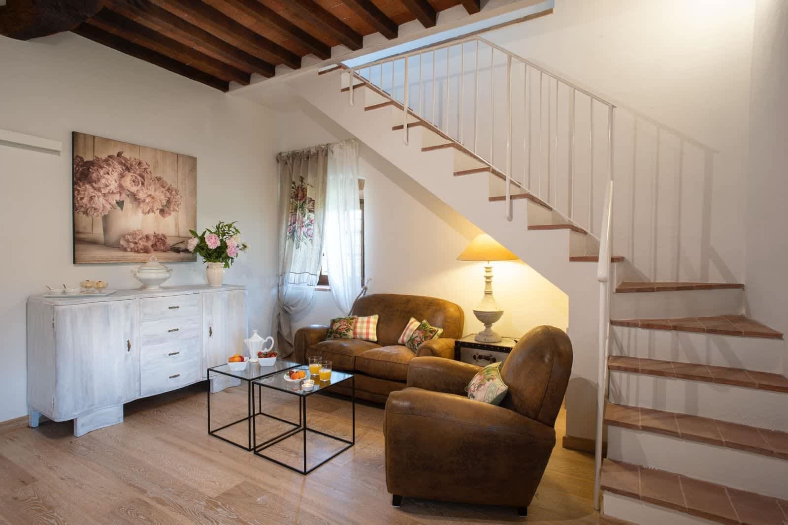 Podere Pianoro — the sitting room by the stairs