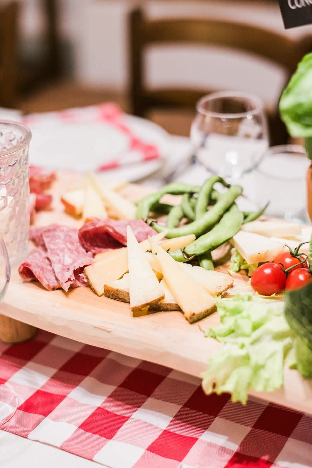 Villa della Cappella — a charcuterie board set out on a checked cloth