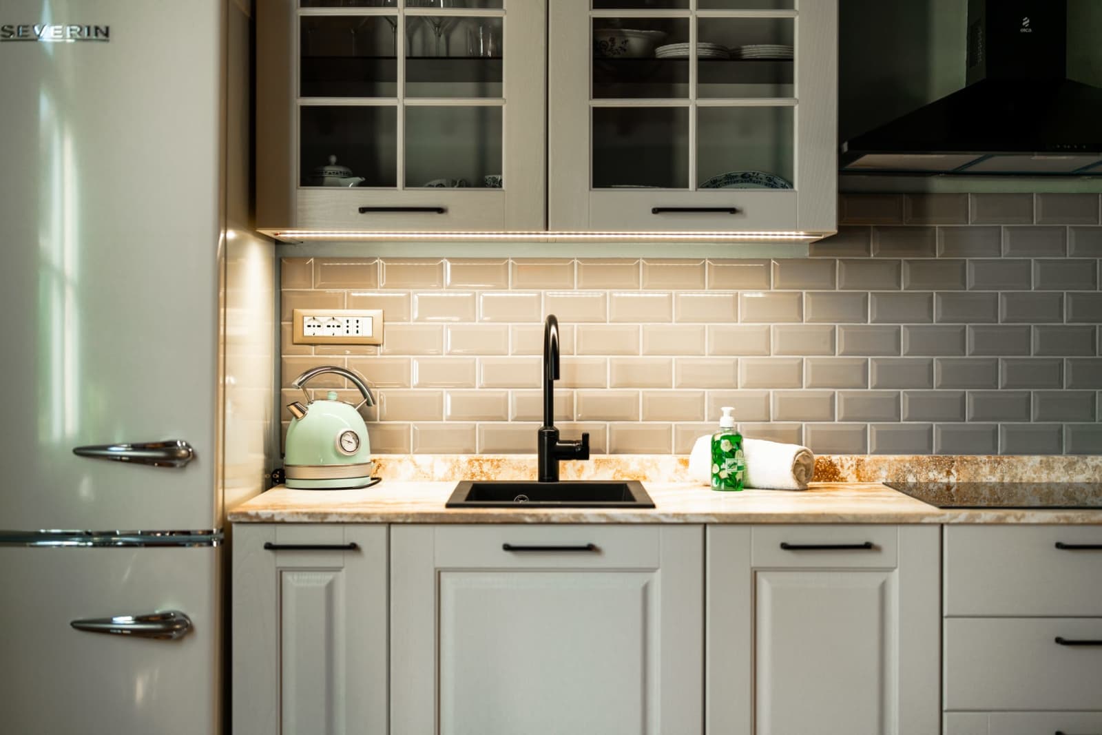 Villa Poggio d'Oro — a grey-green suite kitchen