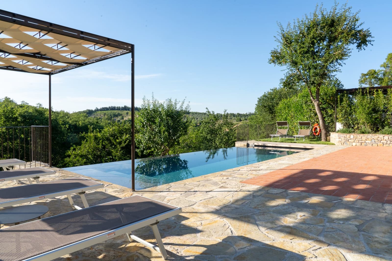Casa Pernicella — the infinity pool's edge over the countryside